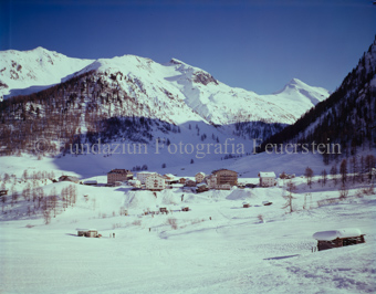 Samnaun Dorf, Winter, mit Mutterspitze