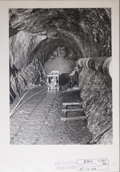 Druckstollen, Maschine, Gruppe Bergarbeiter, Wassereinbruch, Lore