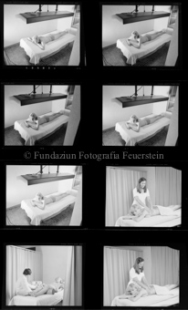 Innenaufnahme, Massage, Frau liegt auf Liege