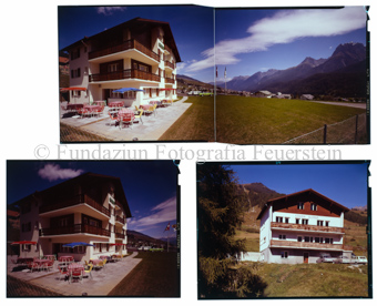 Aussenaufnahme Gebäude mit Wiese und Terrasse