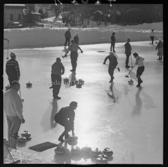 Personen beim Curling