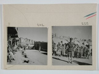 Afghanistan, Ghazni (Ghazna): Menschen; Karteikarte: Händler an einer Strasse, im Hintergrund die Stadtmauern / Männer in Uniform vor einer Gruppe Männern mit Schaufeln