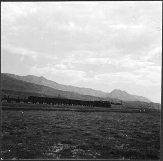 Eisenbahnzug (Lokalisierung unsicher); Ein Eisenbahnzug im Gebirge